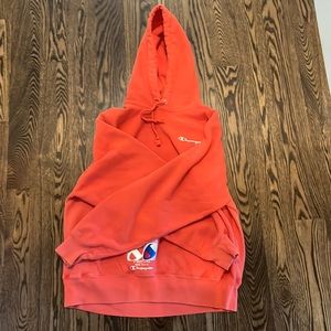 Orange Champion Hoodie.
